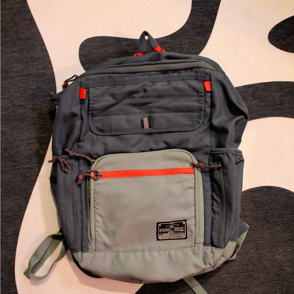 Gray and Black Backpack with Durable Design and Multiple Compartments
